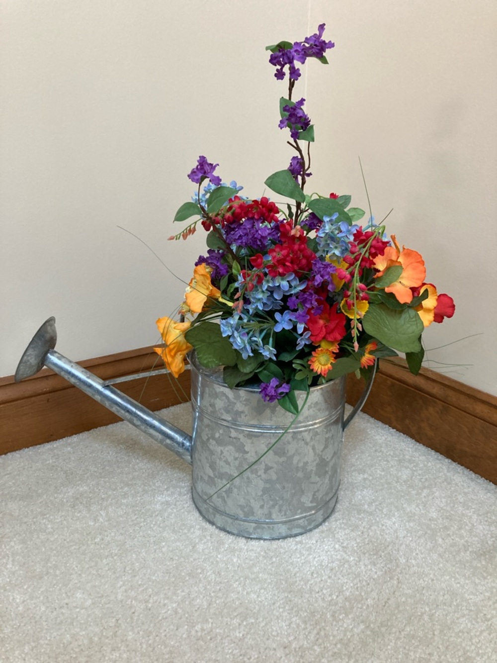Decorative Galvanized Watering Can with Multicolored Floral Arrangement